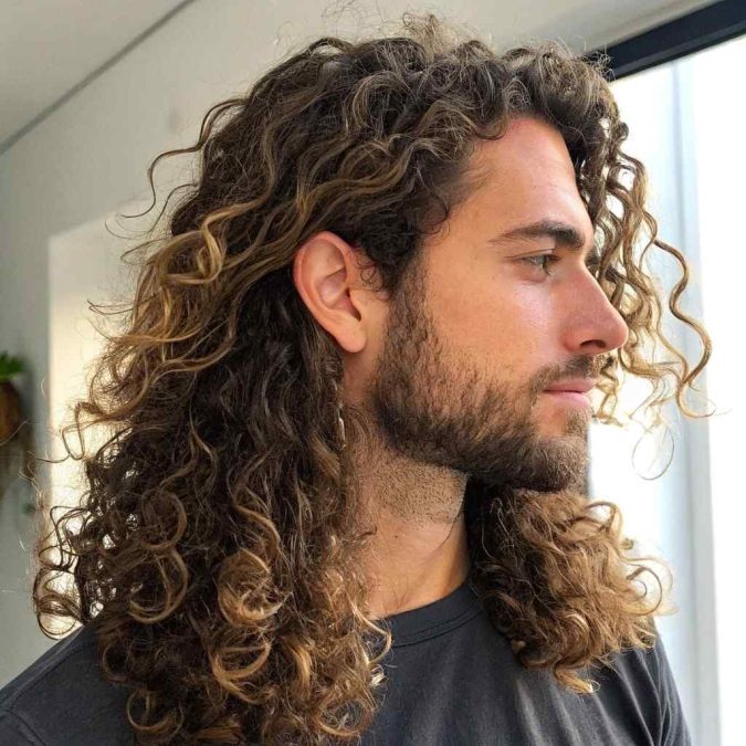 Long curly hairstyle with layered shape and defined curls