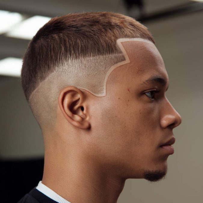 Drop fade buzz cut that contours the head