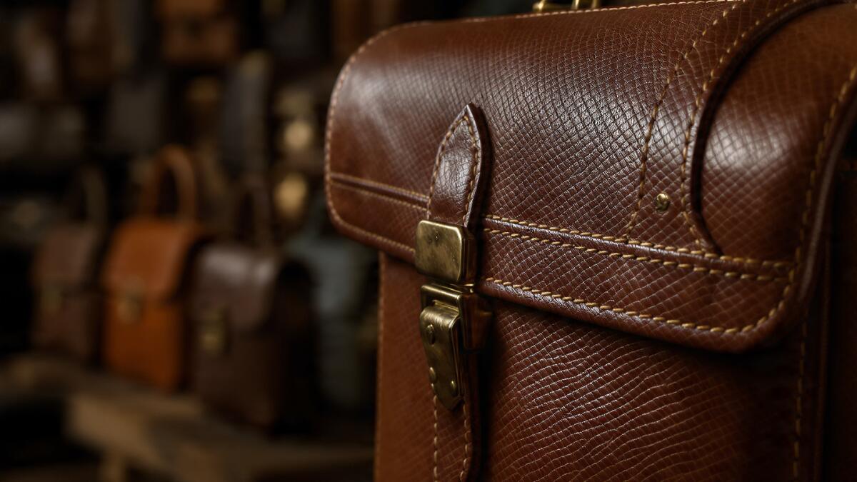 corner of a rich full-grain leather briefcase