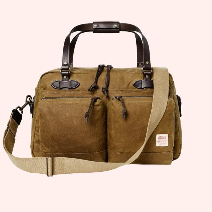 Filson waxed-canvas bag with leather trim.