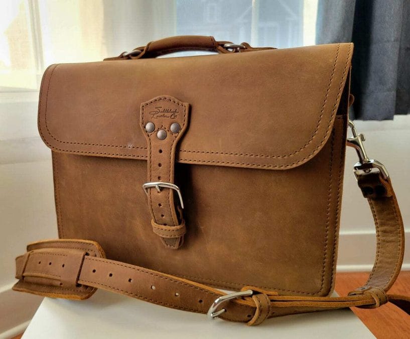 Saddleback full-grain leather holdall.