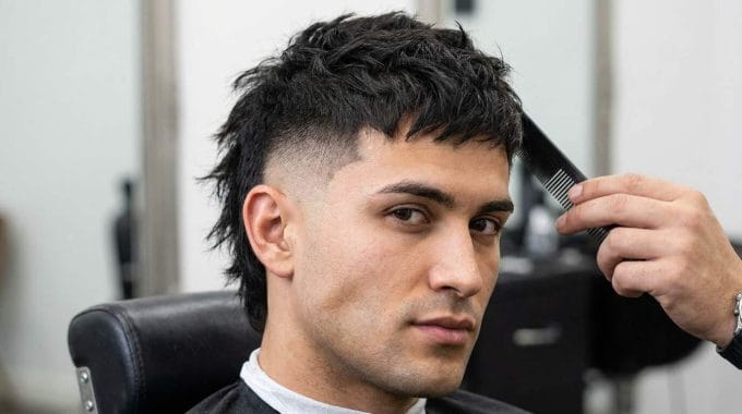 Men's mullet fade haircut.