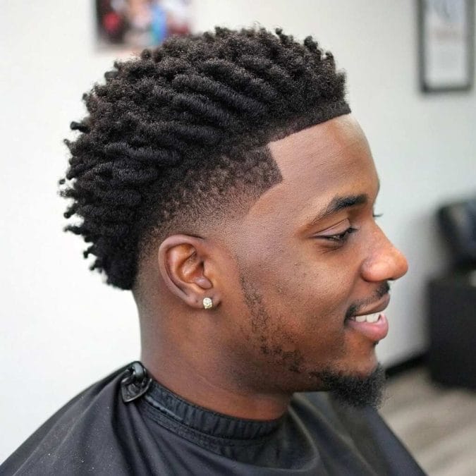 Sponge twists with a mid taper fade, creating texture and clean side transitions.